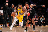 | Photo: AP/Mark J. Terrill : Los Angeles Lakers guard Marcus Smart, left, dribbles while under pressure from Houston Rockets forward Jabari Smith Jr. during the second half in Game 1 of a first-round NBA playoffs basketball series in Los Angeles.