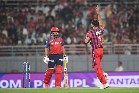 Lucknow Super Giants' Mohammed Shami, right, celebrates the wicket of Punjab Kings' Prabhsimran Singh during the Indian Premier League cricket match between Punjab Kings and Lucknow Super Giants in New Chandigarh, India.