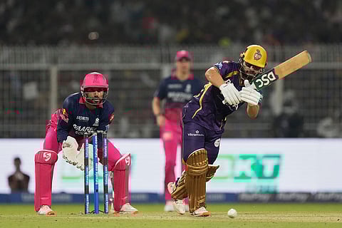 Kolkata Knight Riders' Rinku Singh plays a shot during the Indian Premier League cricket match between Kolkata Knight Riders and Rajasthan Royals in Kolkata, India.