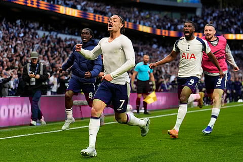 Tottenham Hotspur's Xavi Simons celebrates scoring their side's second goal of the game during their English Premier League soccer match against Brighton & Hove Albion in London.