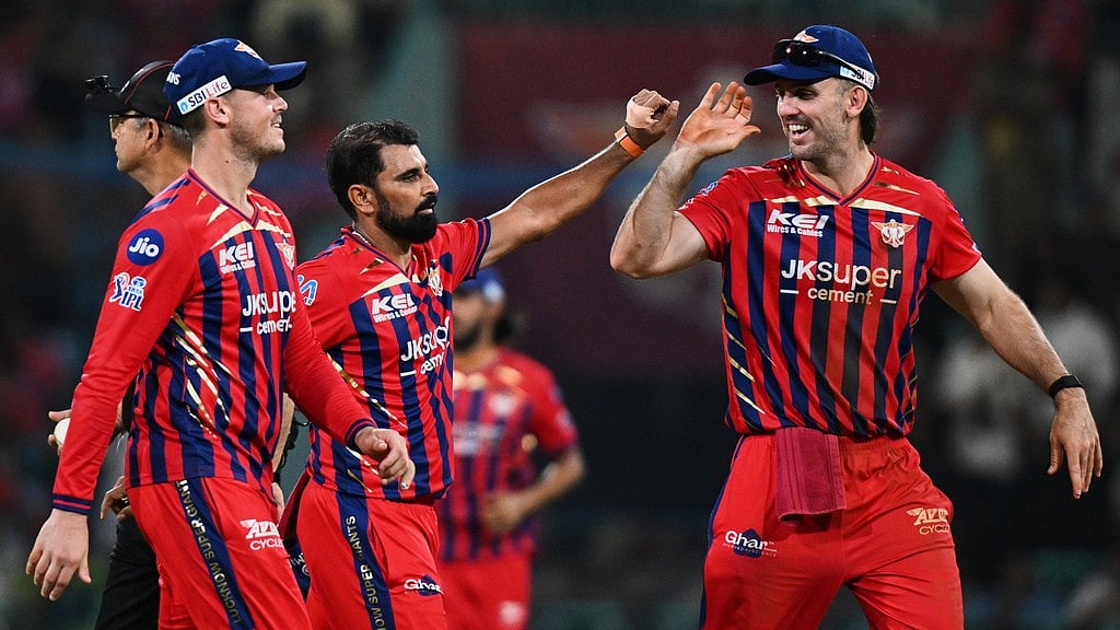 Mohammed Shami, centre, celebrates with teammates the wicket of Jos Buttler during the Indian Premier League match between Gujarat Titans and Lucknow Super Giants in Lucknow. - Photo: AP