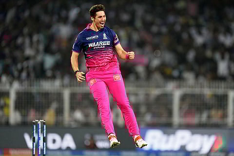 Rajasthan Royals' Nandre Burger celebrates the wicket of Kolkata Knight Riders' captain Ajinkya Rahane during the Indian Premier League cricket match between Kolkata Knight Riders and Rajasthan Royals in Kolkata, India.