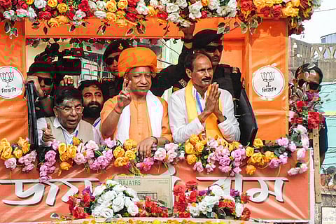 Bankura: Uttar Pradesh Chief Minister Yogi Adityanath takes part in a roadshow during a campaign in support of Bharatiya Janata Party (BJP) candidate Niladri Shekhar Dana ahead of the Assembly elections, in Bankura, West Bengal.