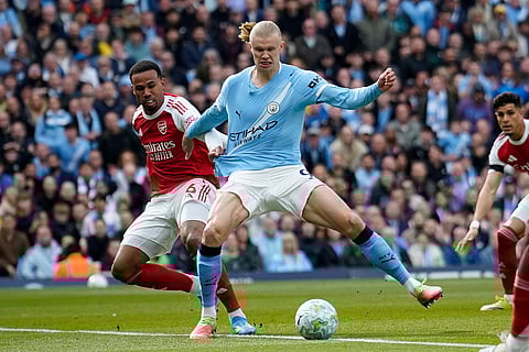 Manchester City's Erling Haaland misses a chance to score during the English Premier League soccer match between Manchester City and and Arsenal, in Manchester, England.