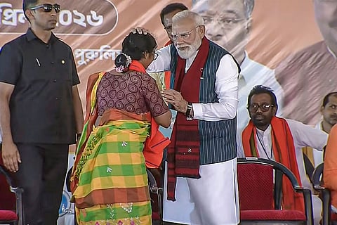 In this screengrab from a video released on April 19, 2026, Prime Minister Narendra Modi being greeted during a 'Vijay Sankalp rally' ahead of West Bengal Assembly elections, in Purulia.