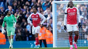 AP/Dave Thompson : Arsenal's Eberechi Eze reacts after Manchester City's Erling Haaland scored his side's second goal during their English Premier League match.