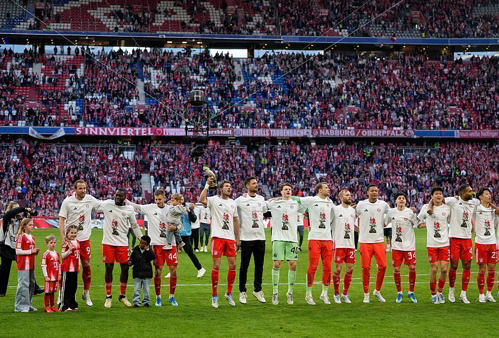 Bayern vs Stuttgart- Bayern players celebrate after their team clinched the German league title