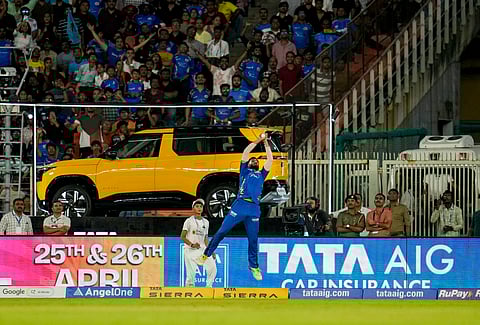 Mumbai Indians' Naman Dhir takes a sensational catch to dismiss Gujarat Titans' Washington Sundar during the Indian Premier League (IPL) 2026 T20 cricket match between Gujarat Titans and Mumbai Indians, in Ahmedabad.