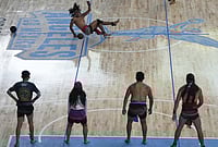 Ulama, The Ancient Mesoamerican Hip-Ball Game, Quietly Making A Comeback | Photo: AP/Fernando Llano : A player returns a ball during an ulama championship, a traditional ballgame with roots in Mesoamerican culture, in Mexico City.