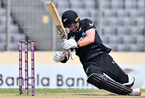 New Zealand's Nick Kelly looses his balance after a ball hits in his helmet from Bangladesh's bowler Shoriful Islam during the second one day international cricket match between Bangladesh and New Zealand in Mirpur, Bangladesh.