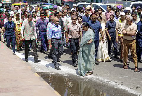 Delhi Chief Minister Rekha Gupta, front centre, during an inspection, in New Delhi. 