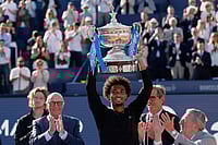 | Photo: AP/Joan Monfort : France's Arthur Fils lifts the trophy after defeating Russia's Andrey Rublev in the ATP Barcelona Open tennis final in Barcelona, Spain.