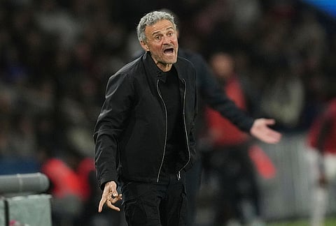 PSG's head coach Luis Enrique reacts during the French League One soccer match between Paris Saint-Germain and Olympique Lyon in Paris, France.
