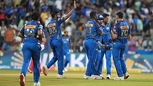 | Photo: AP/Rafiq Maqbool : Mumbai Indians' Allah Gazanfar , right, celebrates the wicket of Punjab Kings' Cooper Connolly with teammates during the Indian Premier League cricket match between Mumbai Indians and Punjab Kings in Mumbai, India, Thursday, April 16, 2026.
