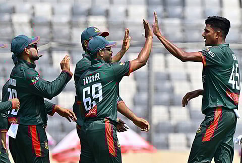 Bangladesh's Nahid Rana, right, celebrates the wicket of New Zealand's Muhammad Abbas during the second one day international cricket match between Bangladesh and New Zealand in Mirpur, Bangladesh.