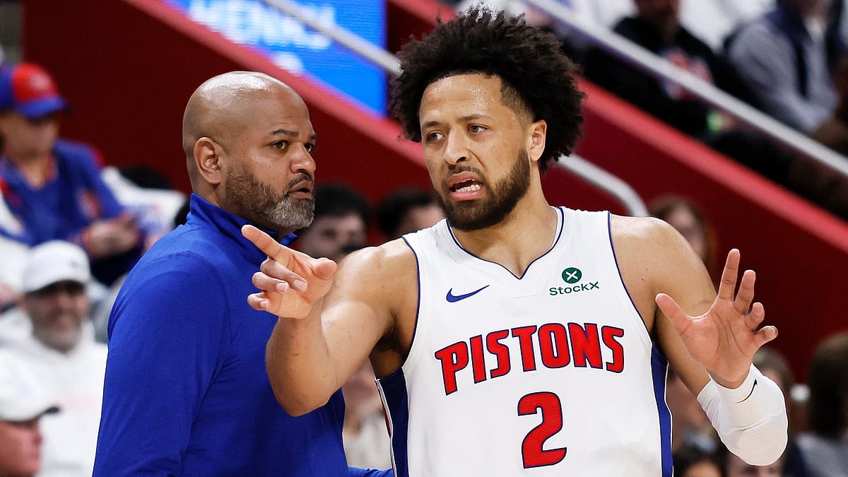 Detroit Pistons guard Cade Cunningham (2) discusses a play with Detroit Pistons head coach J.B. Bickerstaff, left, during the first half in Game 1 against the Orlando Magic in a first-round NBA basketball playoffs series Sunday, April 19, 2026, in Detroit.  - | Photo: AP/Duane Burleson
