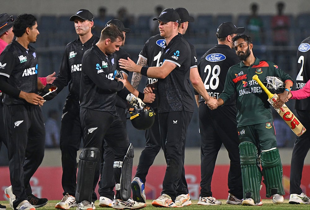 Bangladesh's captain Mehidy Hassan Miraz shake hand with New Zealand players, after winning the second one day international match against New Zealand, in Mirpur, Bangladesh. - | Photo: AP/Mosaraf Hossain