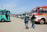 | Photo: PTI : People walk past a bus stand after driver and conductors of private buses stage a protest against the government's proposal to expand Smart City bus services in other districts, in Srinagar, Jammu and Kashmir.