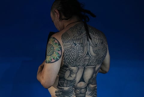 A player prepares for a match during an ulama championship, a traditional ballgame with roots in Mesoamerican culture, in Mexico City.
