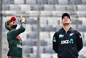 | Photo: AP/Mosaraf Hossain : Bangladesh's captain Mehity Hassan Miraz toss the coin as New Zealand's captain Tom Latham looks on during the second one day international cricket match between Bangladesh and New Zealand in Mirpur, Bangladesh.