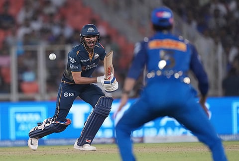 Gujarat Titans' captain Shubman Gill plays a shot during the Indian Premier League cricket match between Gujarat Titans and Mumbai Indians in Ahmedabad.