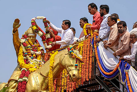 Union Minister Pralhad Joshi garlands a statue of Lord Basaveshwar on the occasion of Basava Jayanti, in Hubballi, Karnataka.