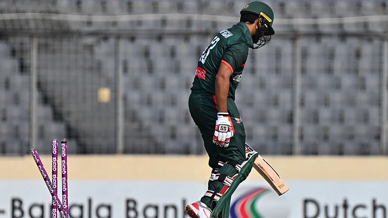 Bangladesh's Md. Saif Hassan leaves the ground after losing his wicket by New Zealand's Nathan Smith during the second one day international cricket match between Bangladesh and New Zealand in Mirpur, Bangladesh, Monday, April 20, 2026 - (AP Photo/Mosaraf Hossain)