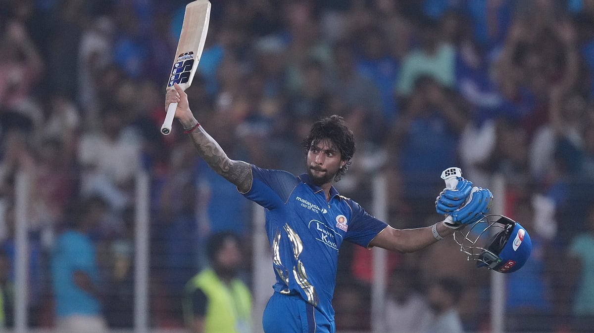 Mumbai Indians' Tilak Verma celebrates his century during the Indian Premier League cricket match between Gujarat Titans and Mumbai Indians in Ahmedabad. - AP Photo