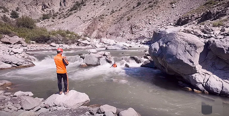 National Disaster Response Force personnel carry out search and rescue operations for Tanveer Ahmad Chopan who jumped into a stream fearing cow vigilantes in Ramban district. - Source: Facebook