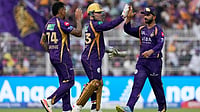Photo: AP/Bikas Das : Kolkata Knight Riders' Sunil Narine, celebrates with teammate Tim Seifert and captain Ajinkya Rahane the wicket of Rajasthan Royals' Yashasvi Jaiswal during the Indian Premier League cricket match between Kolkata Knight Riders and Rajasthan Royals in Kolkata, India.