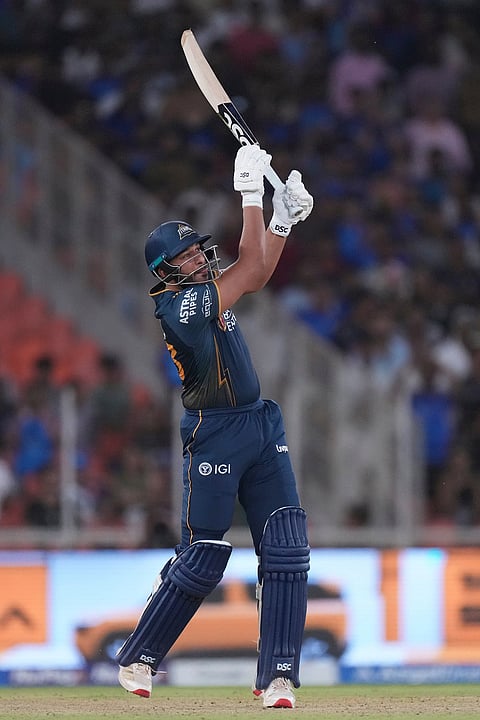 Gujarat Titans' Shahrukh Khan plays a shot during the Indian Premier League cricket match between Gujarat Titans and Mumbai Indians in Ahmedabad.