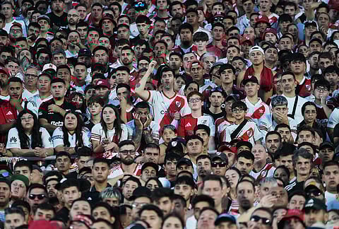 River Plate fans watch from the stands an Argentine league match against Boca Juniors in Buenos Aires, Argentina.
