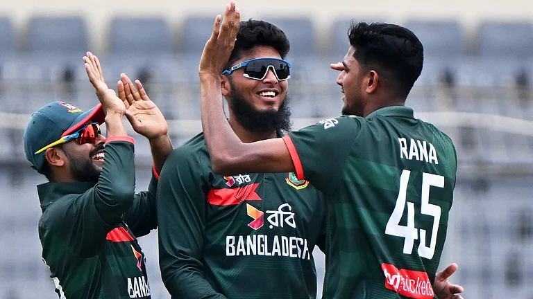 Bangladesh's Nahid Rana celebrates the wicket of New Zealand's Henry Nicholls during the second one day international cricket match between Bangladesh and New Zealand in Mirpur, Bangladesh, Monday, April 20, 2026. - (AP Photo/Mosaraf Hossain)