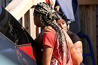 Shreveport Shooting: Man Kills Eight Children And Shoots Two Women In Louisiana Source: AP : People grieve outside the scene of a mass shooting, Sunday, April 19, 2026, in Shreveport, La. (AP Photo/Gerald Herbert)