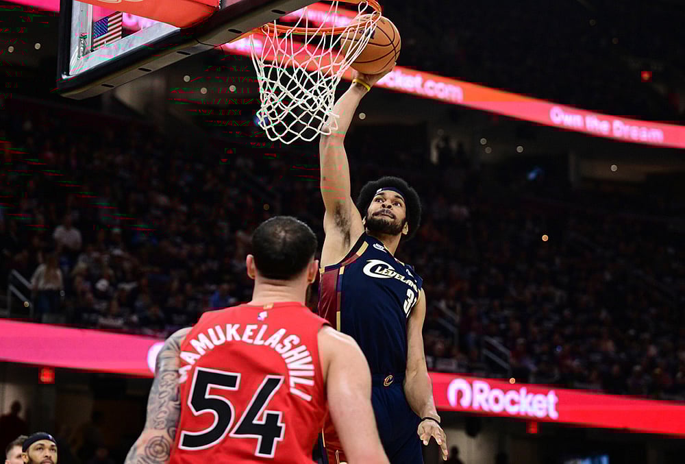 Cleveland Cavaliers center Jarrett Allen dunks over Toronto Raptors forward Sandro Mamukelashvili during the second half in Game 1 of a first-round NBA playoffs basketball series in Cleveland.  - | Photo: AP/David Dermer