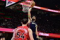 | Photo: AP/David Dermer : Cleveland Cavaliers center Jarrett Allen dunks over Toronto Raptors forward Sandro Mamukelashvili during the second half in Game 1 of a first-round NBA playoffs basketball series in Cleveland. 