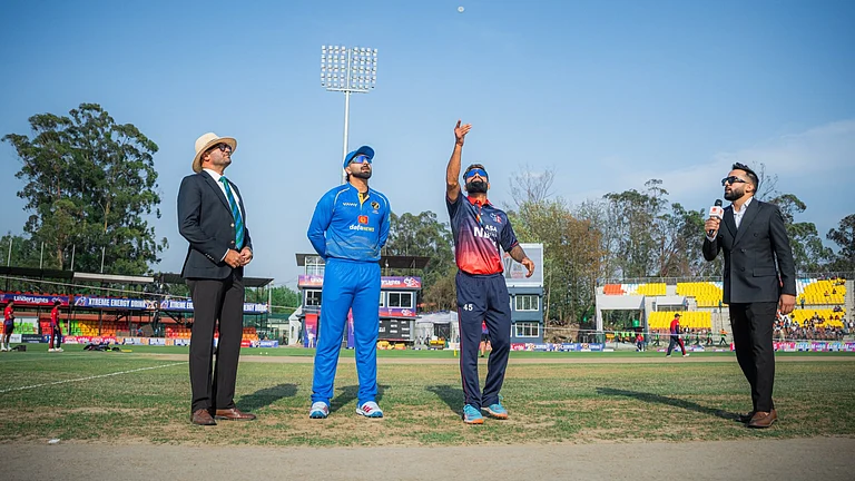 Captains Dipendra Singh Airee (second from right) and Muhammad Waseem at the toss for the first Nepal vs UAE T20I in Kirtipur. - Photo: X/CricketNep
