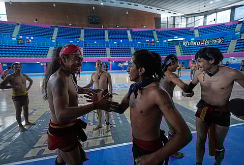 Players celebrate after an ulama championship match, a traditional ballgame with roots in Mesoamerican culture, in Mexico City.