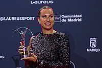| Photo: AP/Manu Fernandez : Belarusian tennis player Aryna Sabalenka poses with the award during the 2026 Laureus World Sports Awards ceremony in Madrid, Spain.