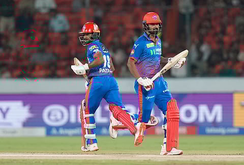 Delhi Capitals' KL Rahul, right, and Delhi Capitals' Pathum Nissanka run between the wickets during the Indian Premier League cricket match between Sunrisers Hyderabad and Delhi Capitals in Hyderabad.
