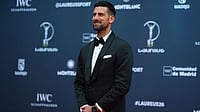Novak Djokovic’s Honest Virat Kohli Confession Leaves Cricket Fans Stunned At Laureus Awards | Photo: AP/Manu Fernandez : Tennis player Novak Djokovic poses as he arrives for the 2026 Laureus World Sports Awards ceremony in Madrid, Spain.