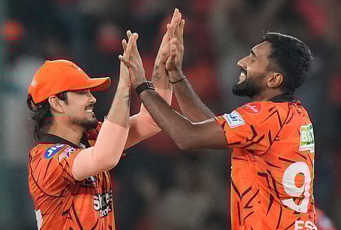 Sunrisers Hyderabad's Eshan Malinga, right, and Sunrisers Hyderabad's captain Ishan Kishan celebrates the wicket of Delhi Capitals' Nitish Rana during the Indian Premier League cricket match between Sunrisers Hyderabad and Delhi Capitals in Hyderabad.
