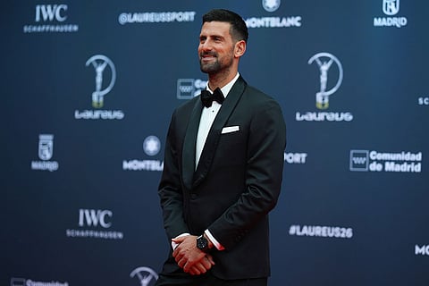 Tennis player Novak Djokovic poses as he arrives for the 2026 Laureus World Sports Awards ceremony in Madrid, Spain.
