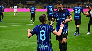 Inter/X : Hakan Calhanoglu and Petar Sucic celebrate as Inter Milan complete comeback victory for Como in Coppa Italia 2025-26 semi final at San Siro.