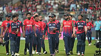| Photo: AP/Rafiq Maqbool : Nepal cricket team walks back to the pavilion after defeating Scotland during the T20 World Cup cricket match in Mumbai.