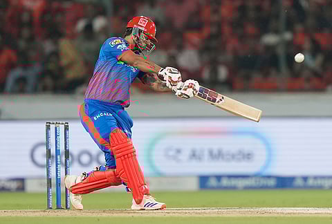 Delhi Capitals' Nitish Rana hits a six during the Indian Premier League cricket match between Sunrisers Hyderabad and Delhi Capitals in Hyderabad.