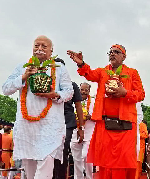 RSS chief Mohan Bhagwat performs rituals during the inauguration ceremony of the Maa Soundarya Chinmayi temple, at Mohanpur in West Tripura.