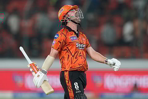Sunrisers Hyderabad's Travis Head reacts as he leaves the ground after losing his wicket during the Indian Premier League cricket match between Sunrisers Hyderabad and Delhi Capitals in Hyderabad.