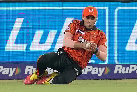 Sunrisers Hyderabad's Abhishek Sharma takes the catch to dismiss Delhi Capitals' Nitish Rana during the Indian Premier League cricket match between Sunrisers Hyderabad and Delhi Capitals in Hyderabad.