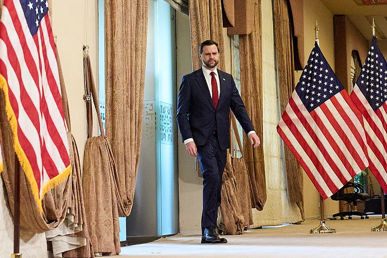 Vice President JD Vance arrives to speak at a news conference after meeting with representatives from Pakistan and Iran, Sunday, - Jacquelyn Martin